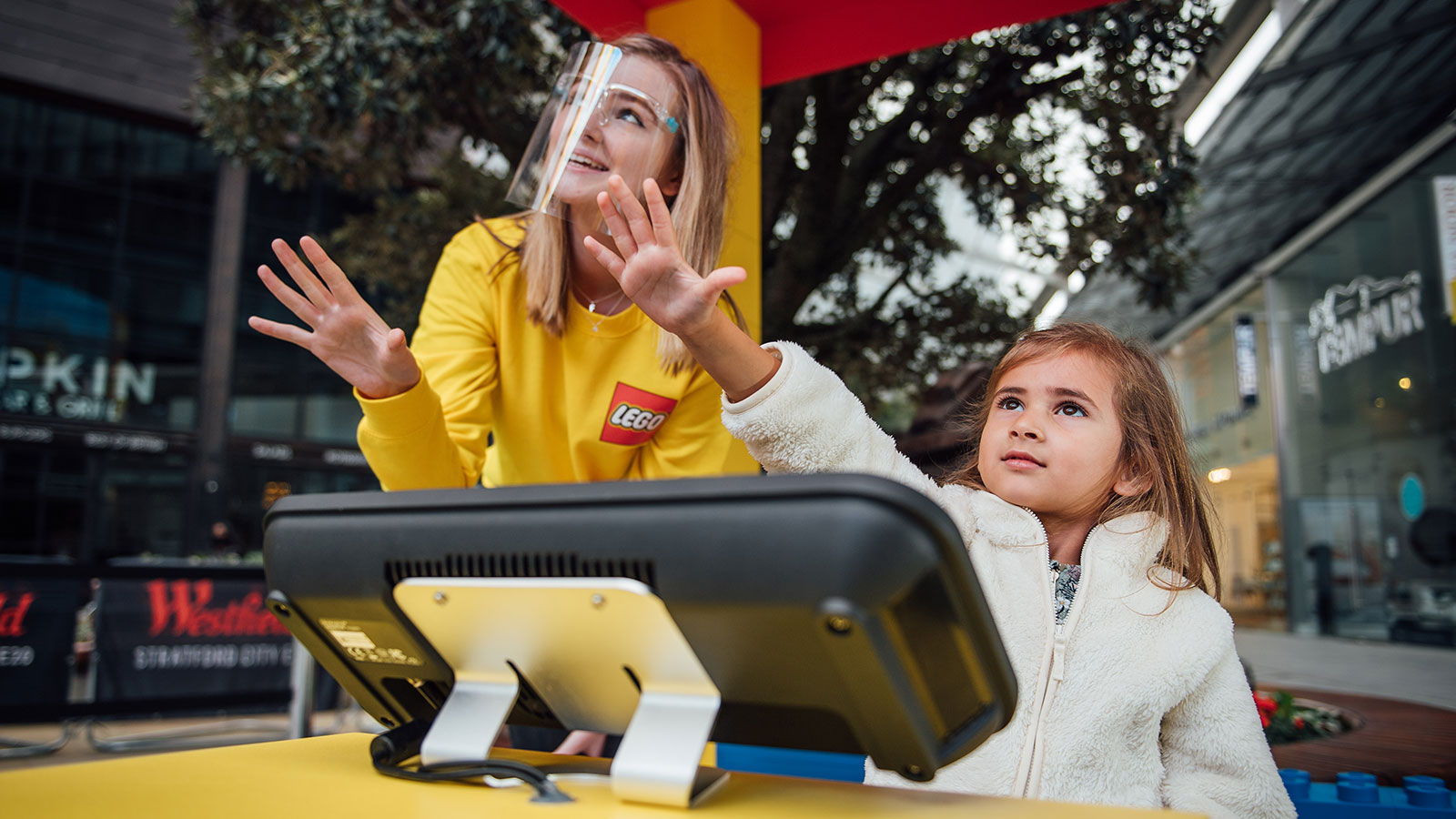 Child interacting with Lego mid-air haptic experience