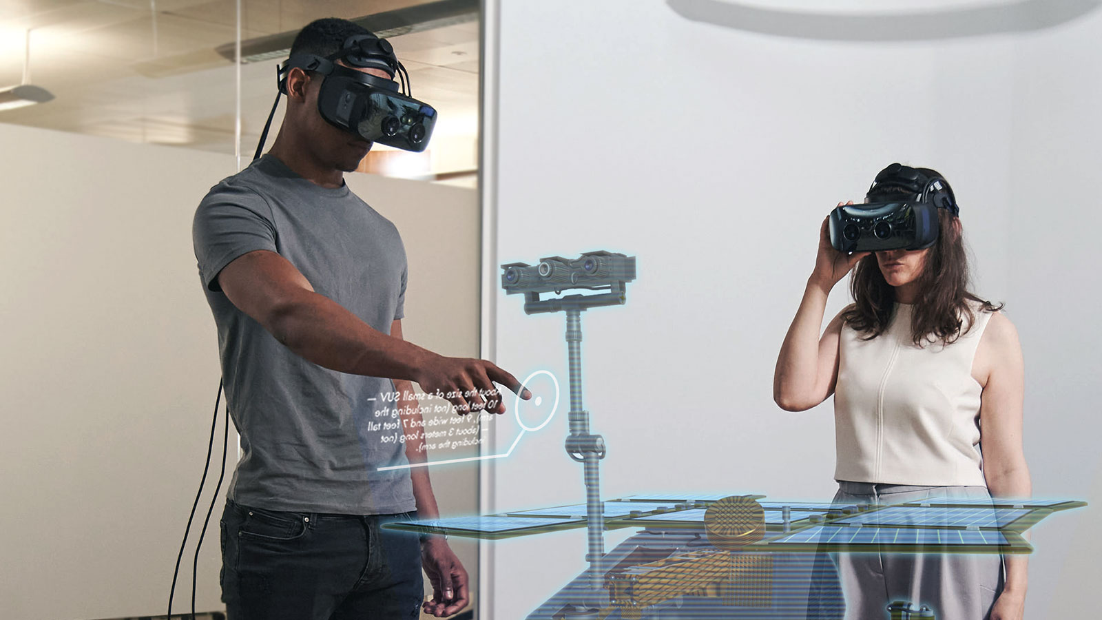 Two people wearing Varjo headset using Ultraleap hand tracking with Gemini