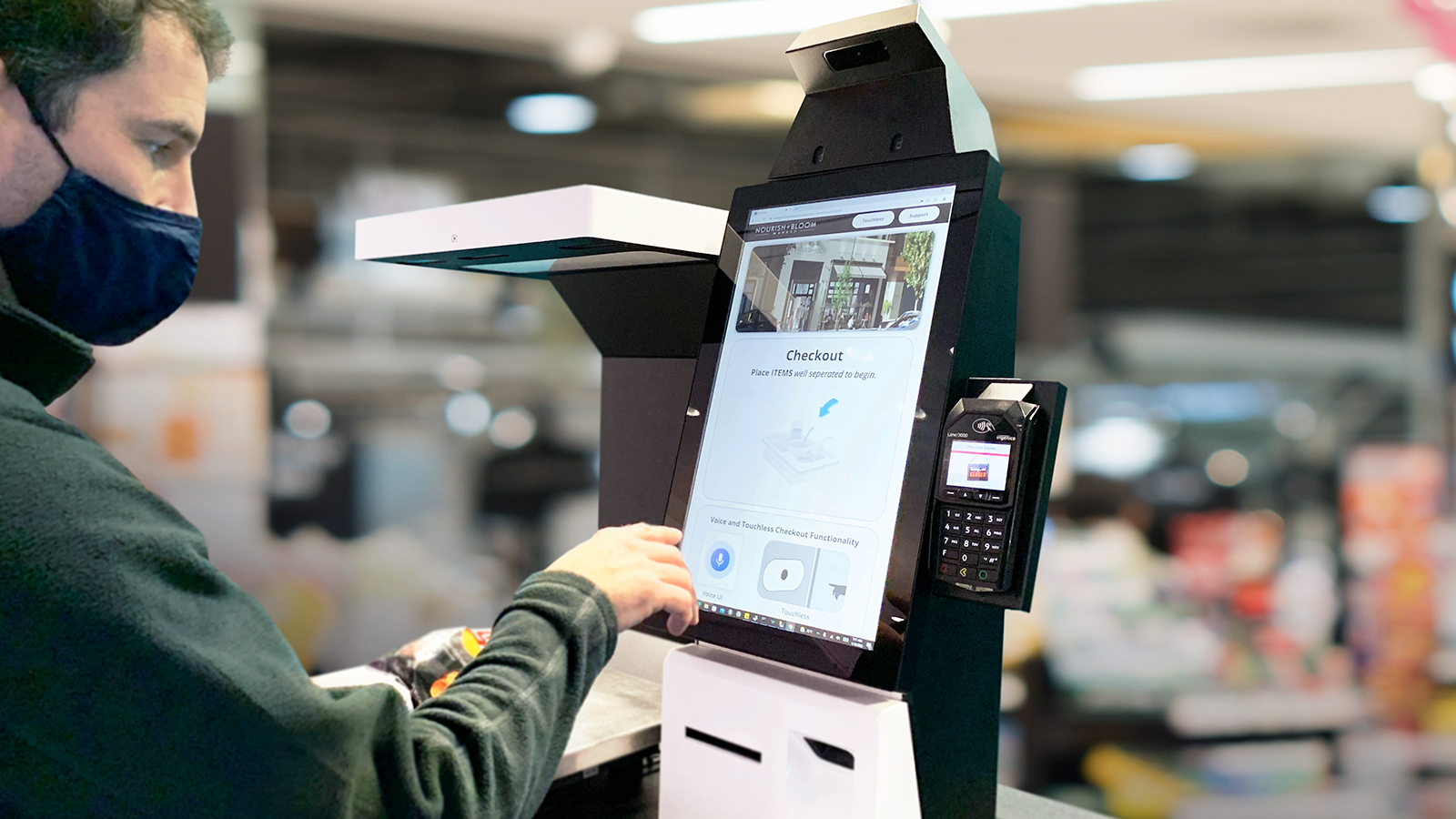 Self checkout kiosk with touchless interface